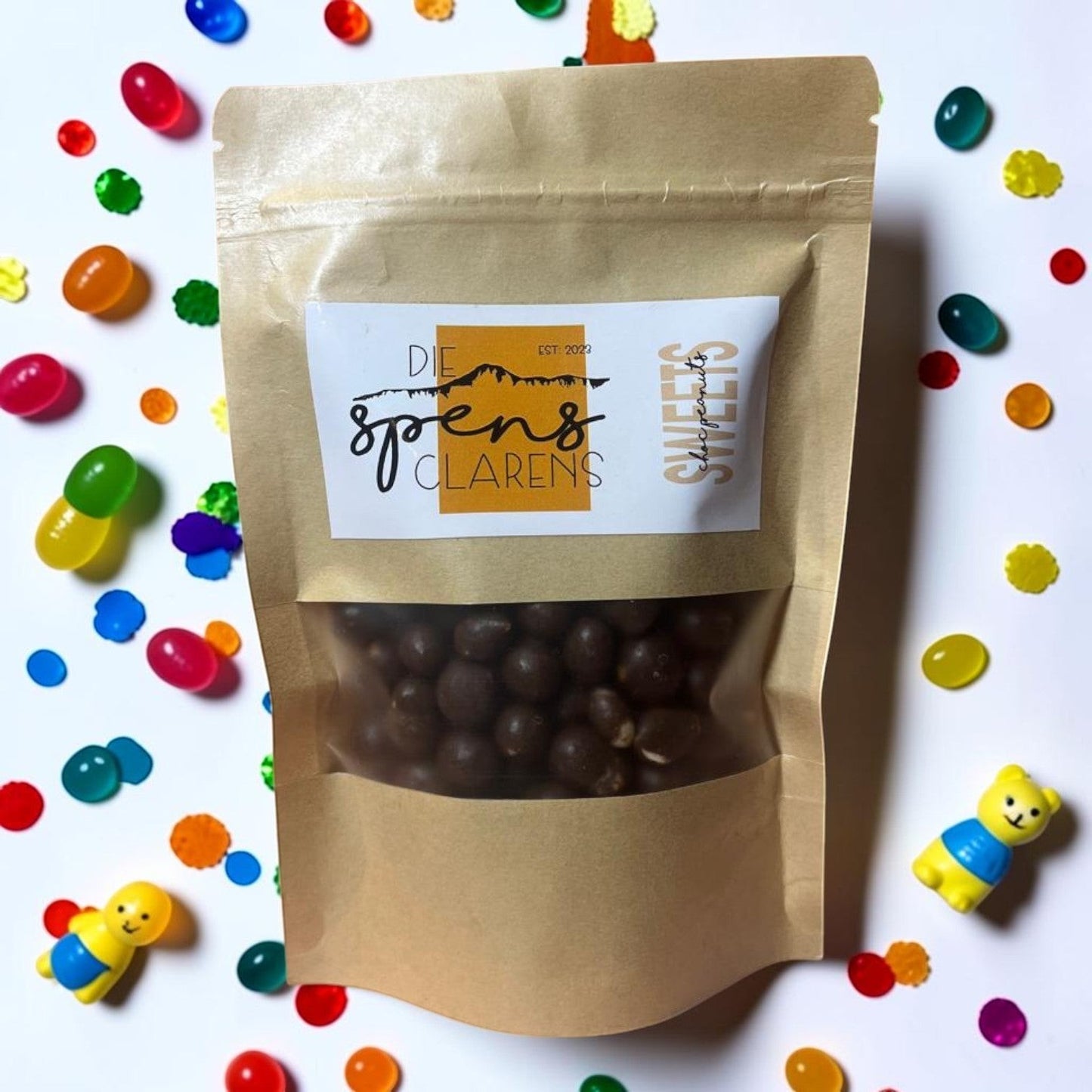 Die Spens Clarens resealable bag of chocolate-covered peanuts, a sweet and nutty snack.