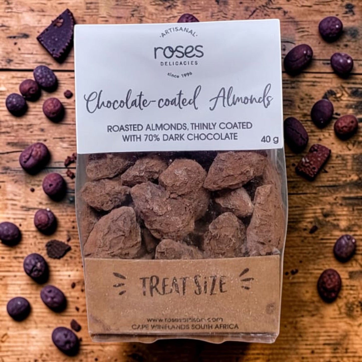 Die Spens Clarens artisanal dark chocolate coated almonds, 40g treat size pack. Roasted almonds with 70% dark chocolate coating.