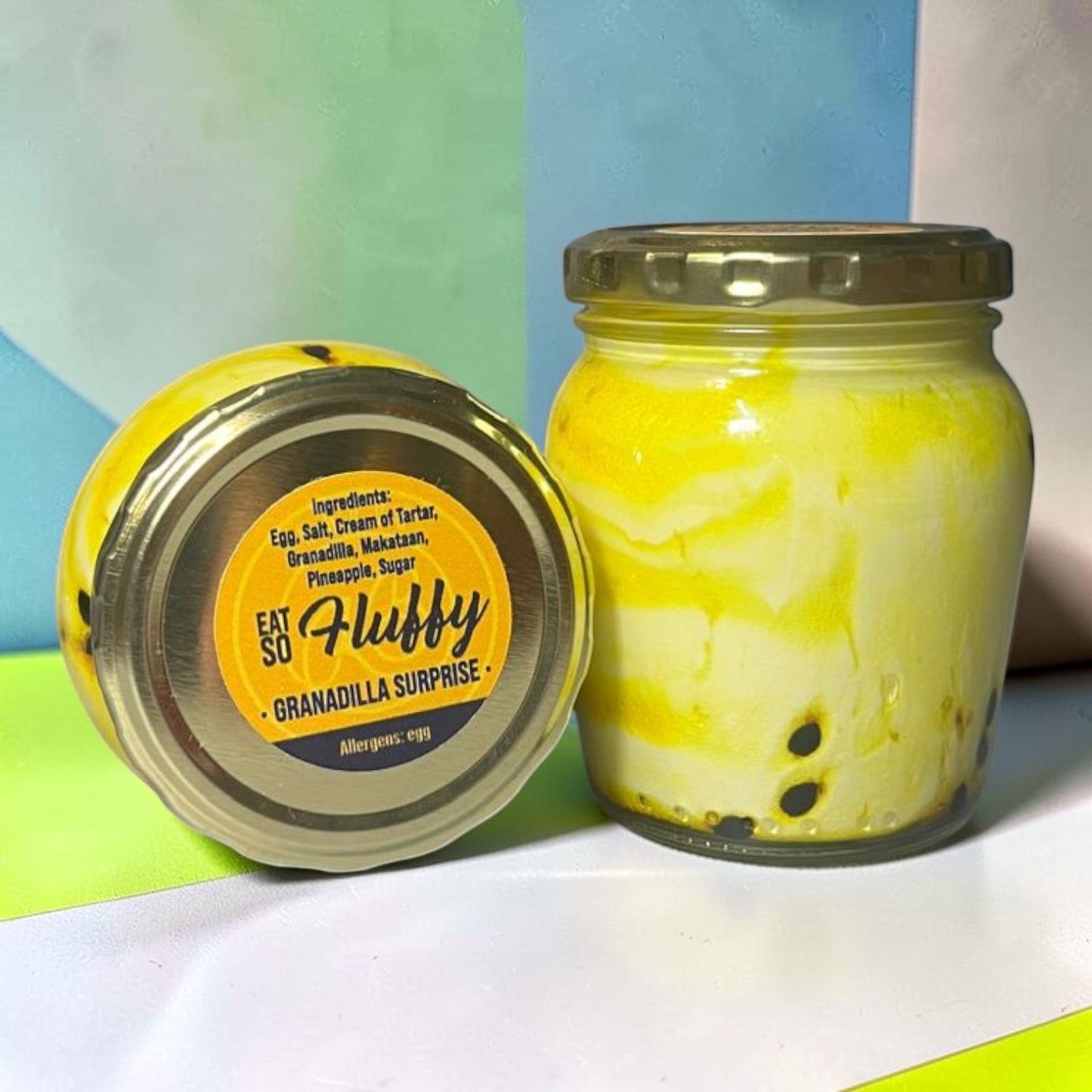Die Spens Clarens Karoo Blessing Granadilla Fluffy dessert in a jar, creamy yellow with swirls and visible granadilla seeds.
