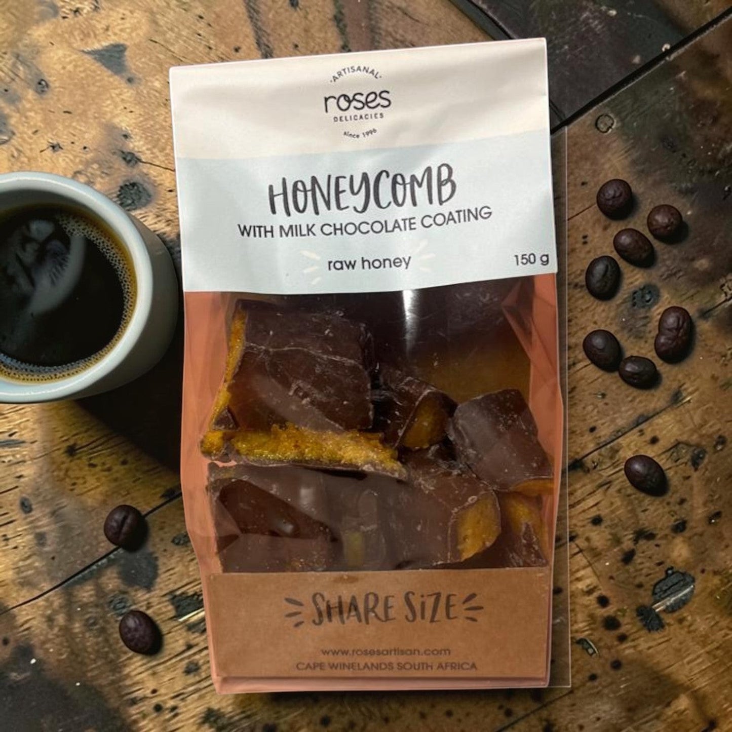 Die Spens Clarens artisanal honeycomb coated in milk chocolate, made with raw honey.