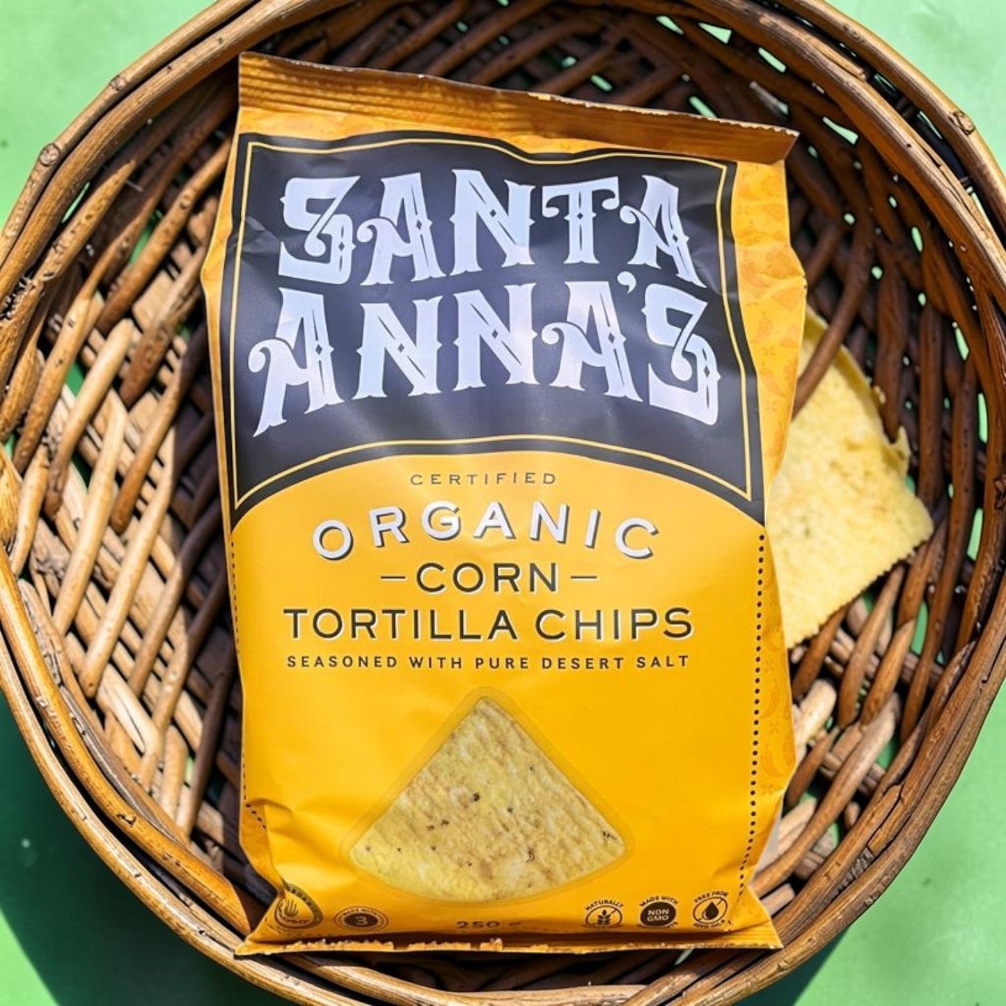 Die Spens Clarens Santa Anna's organic corn tortilla chips in a yellow bag, seasoned with pure desert salt.
