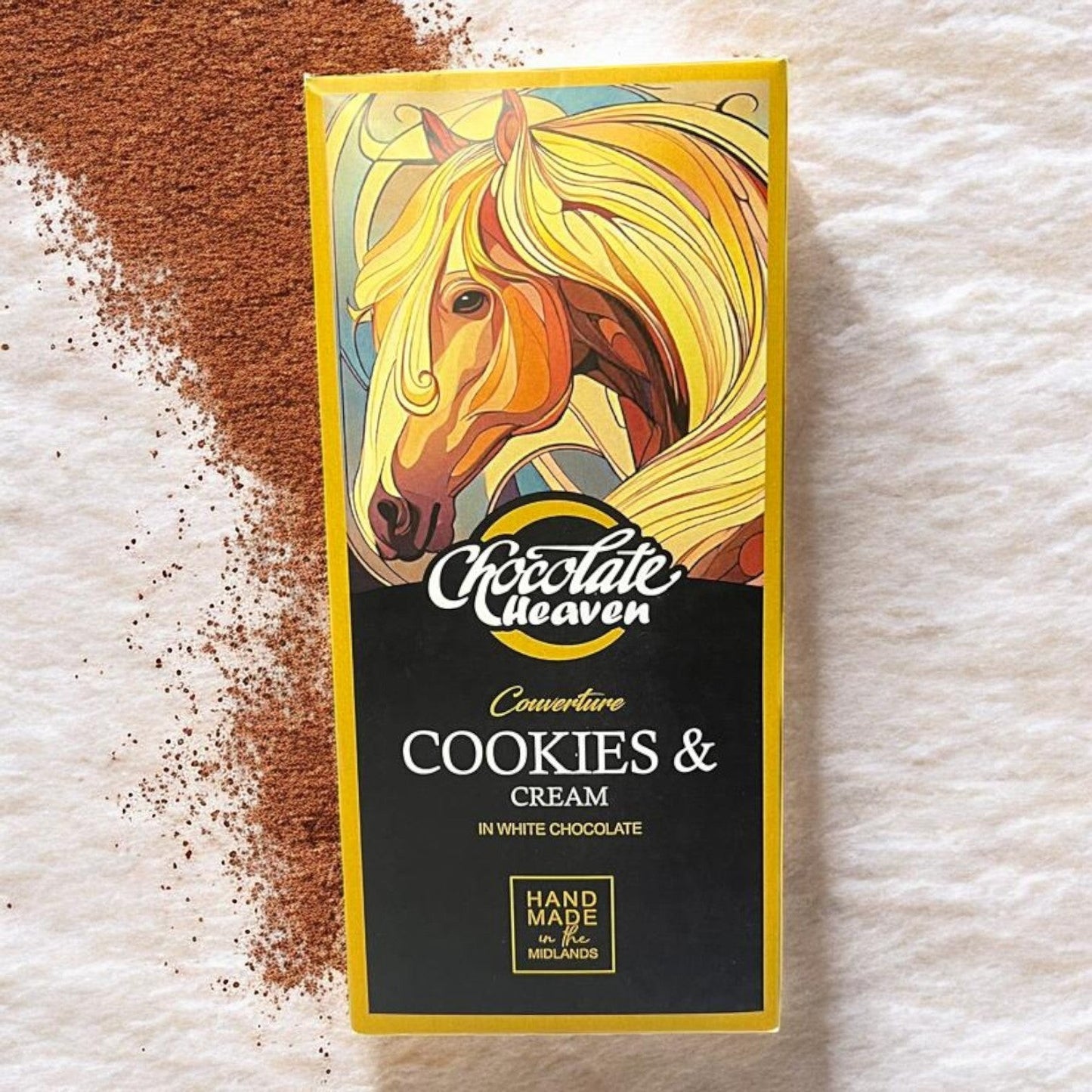 Die Spens Clarens Chocolate Heaven Cookies & Cream bar with white chocolate and cookie pieces. Hand-made.