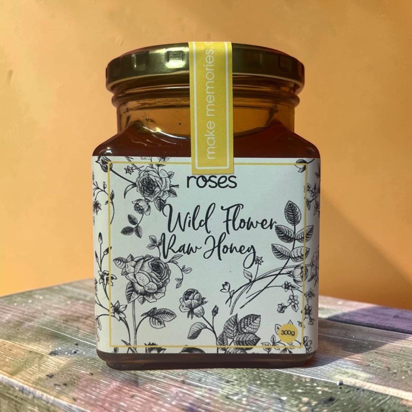 Die Spens Clarens Roses artisanal wild flower raw honey in a 300g glass jar with a floral design label.