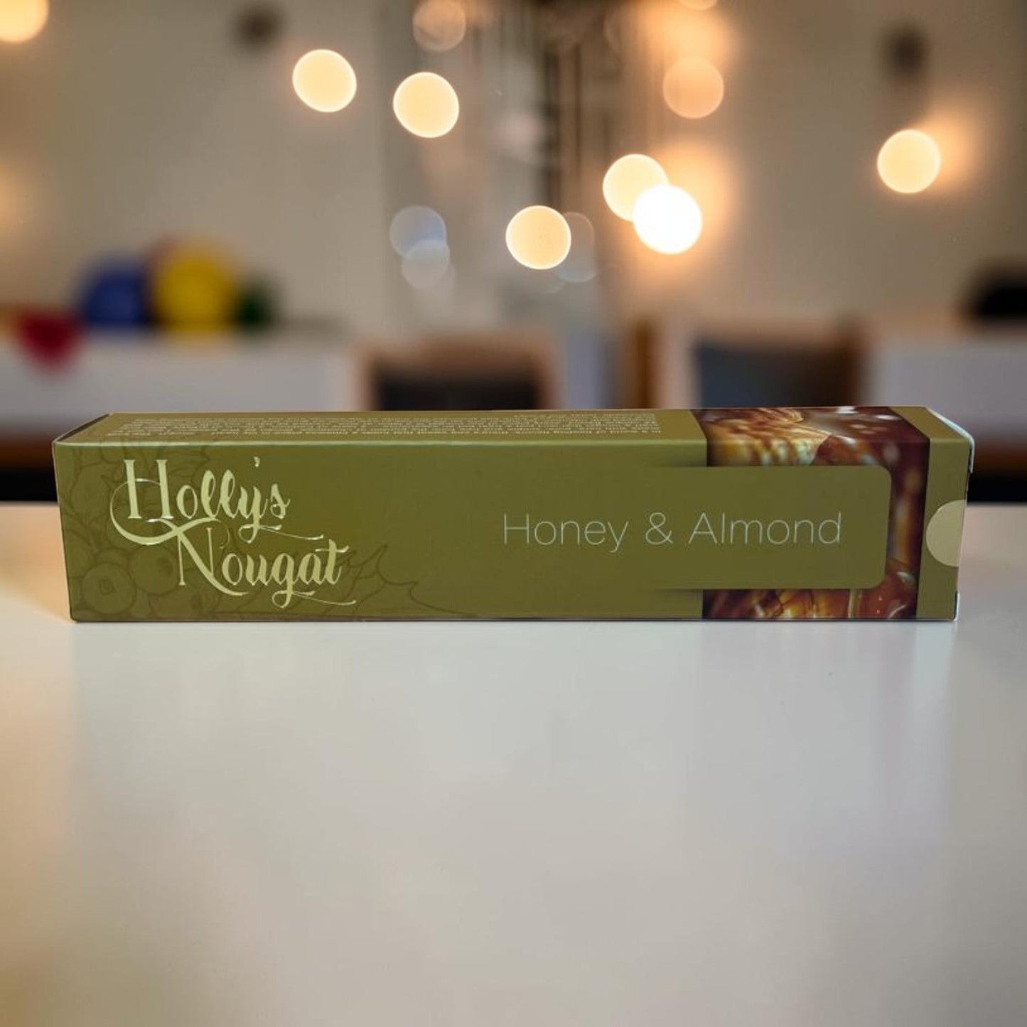 Die Spens Clarens Holly's Nougat Honey & Almond flavour traditional confection in a green box.