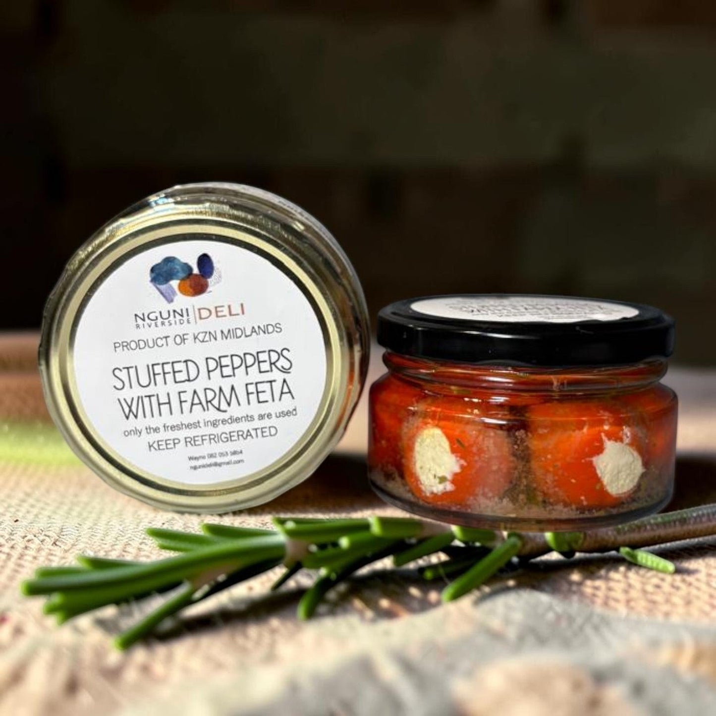 Die Spens Clarens Nguni Deli stuffed peppadews with farm feta in a jar, a gourmet appetizer.