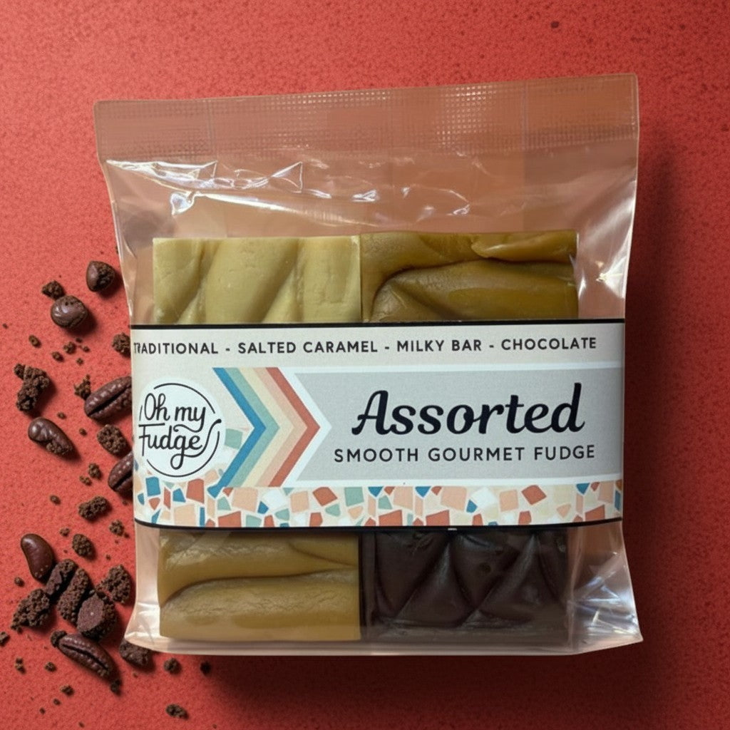 Die Spens Clarens Oh My Fudge assorted smooth gourmet fudge pack with four flavours: traditional, salted caramel, milky bar, and chocolate.
