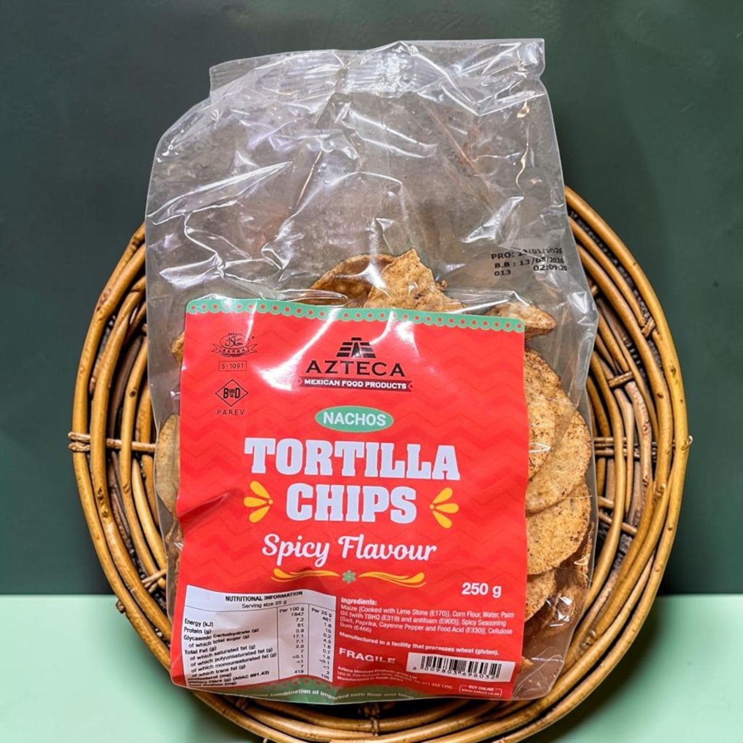 Die Spens Clarens Azteca Nachos Tortilla Chips Spicy Flavour, 250g bag of crunchy corn tortilla chips seasoned with chili.