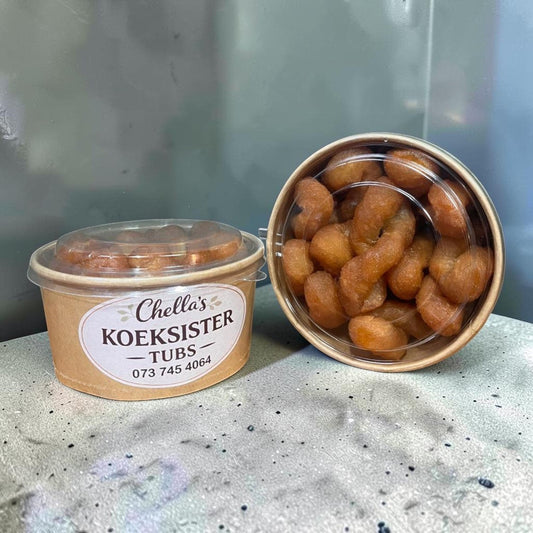 Die Spens Clarens Chella's Koeksister Tubs featuring golden-brown, syrup-soaked traditional South African pastries.