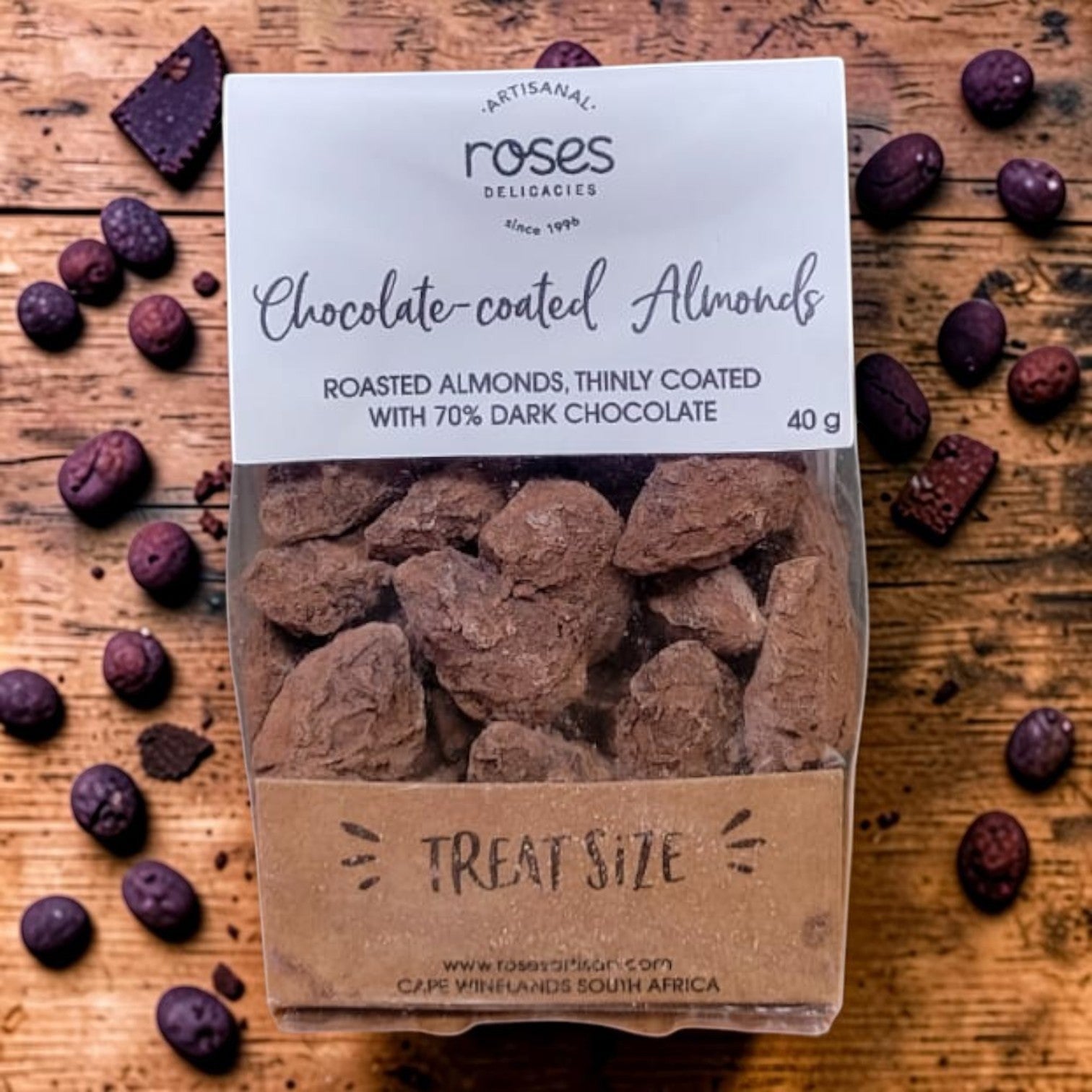 Die Spens Clarens artisanal dark chocolate coated almonds, 40g treat size pack. Roasted almonds with 70% dark chocolate coating.