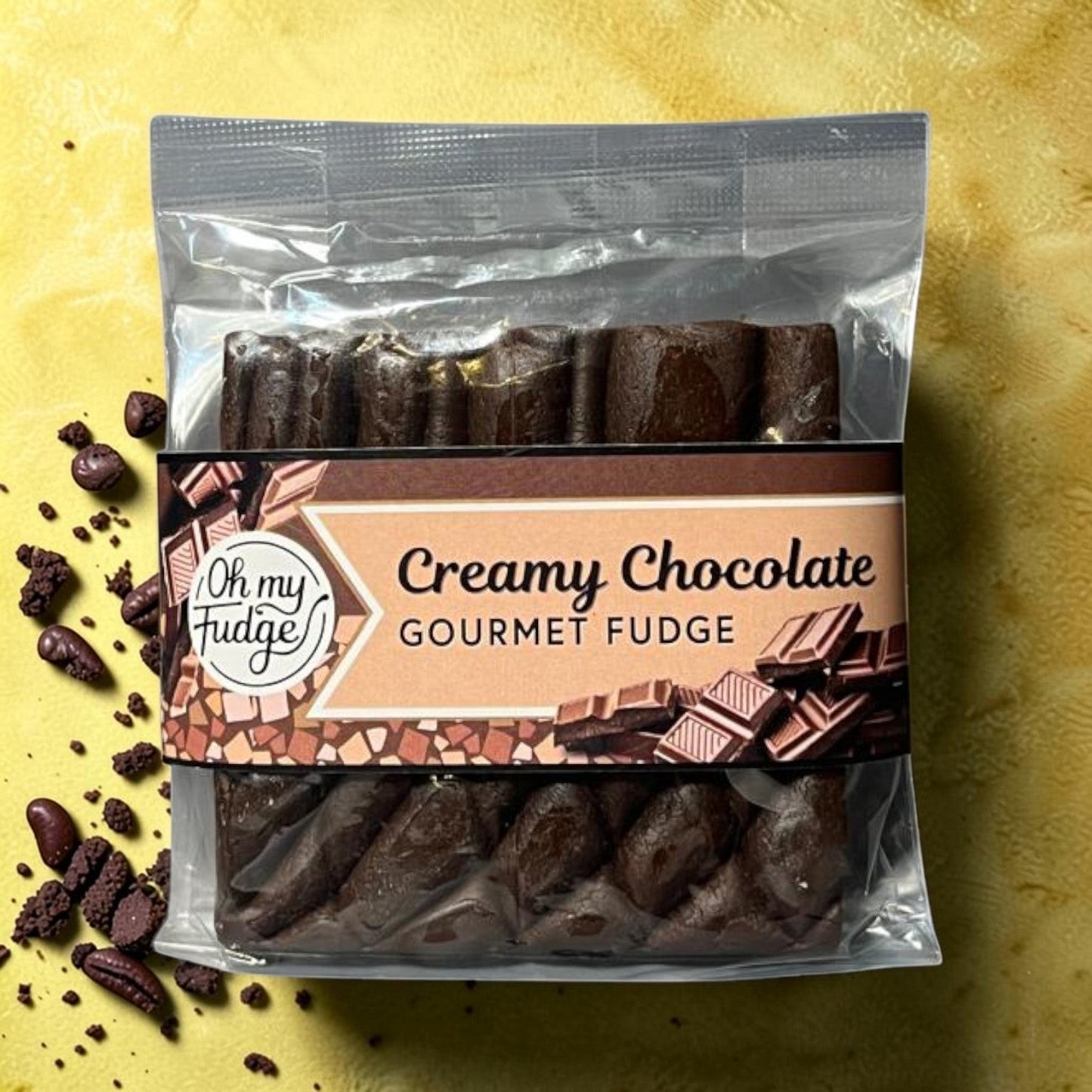 Die Spens Clarens Oh My Fudge Creamy Chocolate Gourmet Fudge 4 block pack. Rich, dark chocolate fudge pieces in a clear bag with branded label.