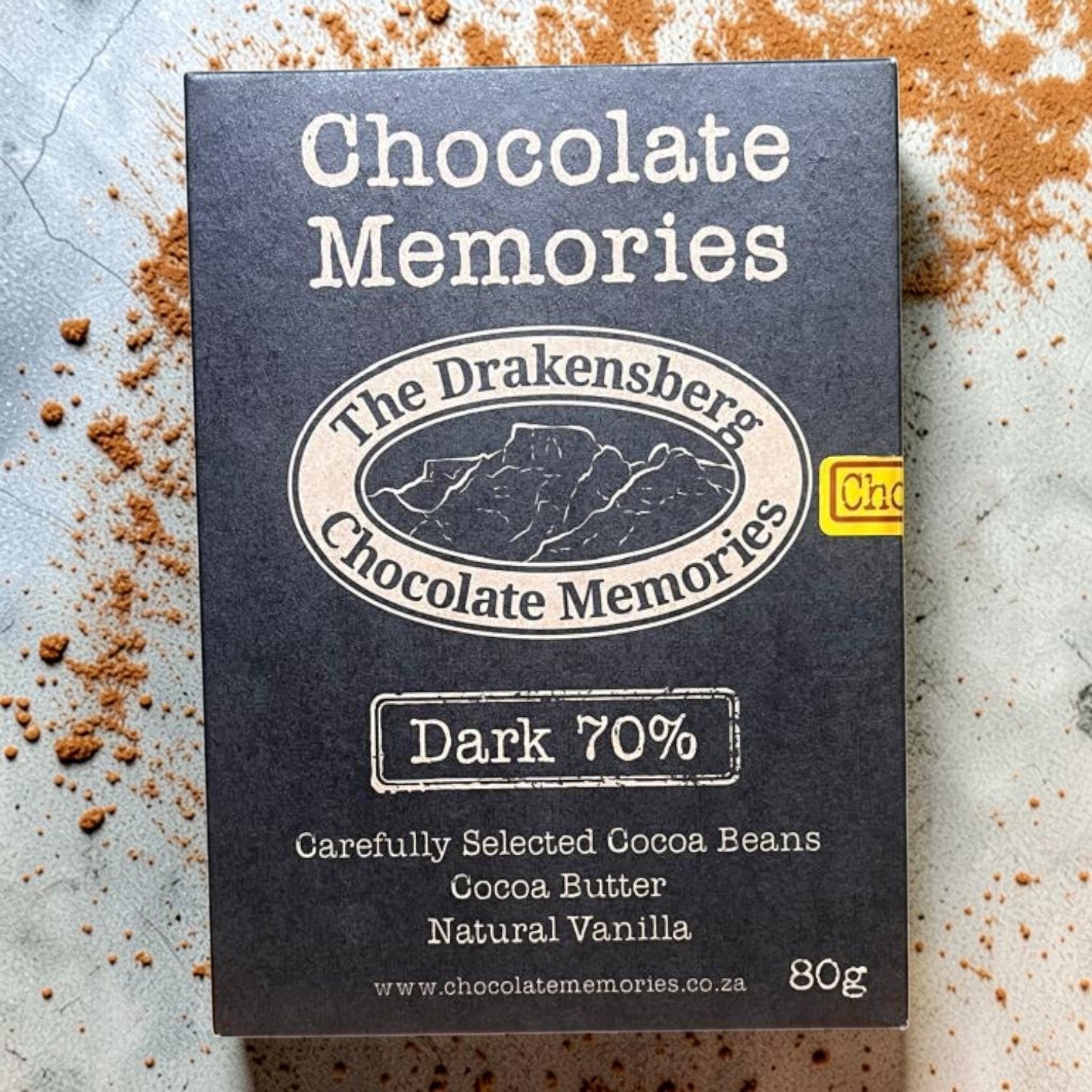 Die Spens Clarens Chocolate Memories 70% dark chocolate bar in black packaging with cocoa powder dusting.