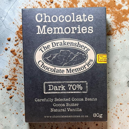 Die Spens Clarens Chocolate Memories 70% dark chocolate bar in black packaging with cocoa powder dusting.