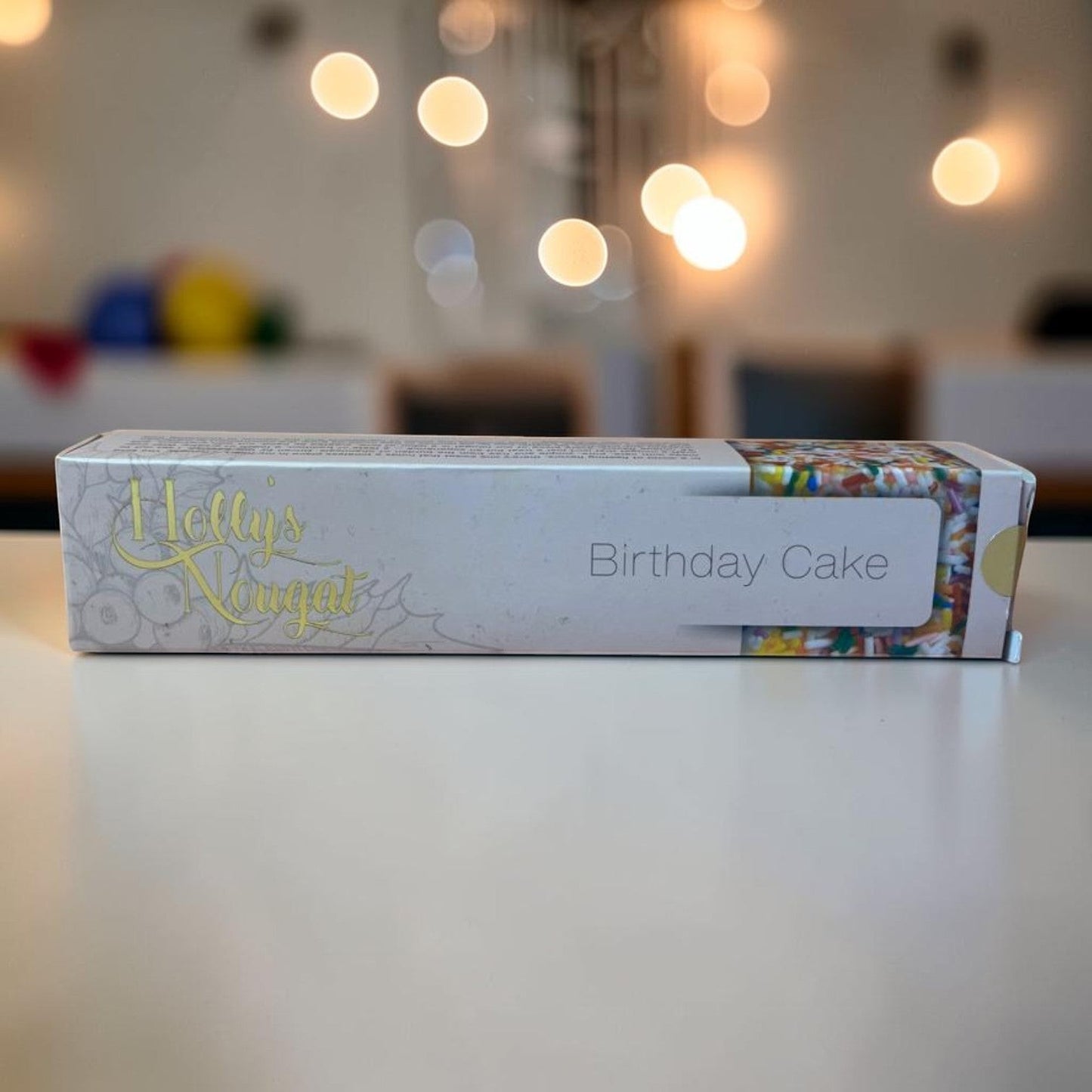 Die Spens Clarens Holly's Nougat Birthday Cake flavor with colorful sprinkles. Chewy, sweet confection perfect for celebrations.