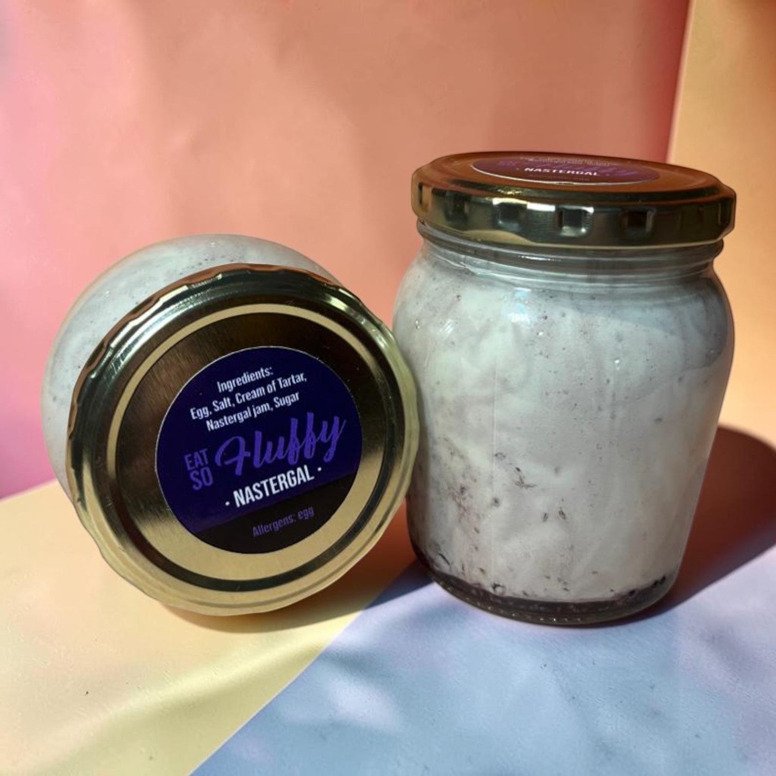 Die Spens Clarens Nastergal Fluffy artisanal spread in a glass jar with a gold lid. Creamy white spread with dark flecks.