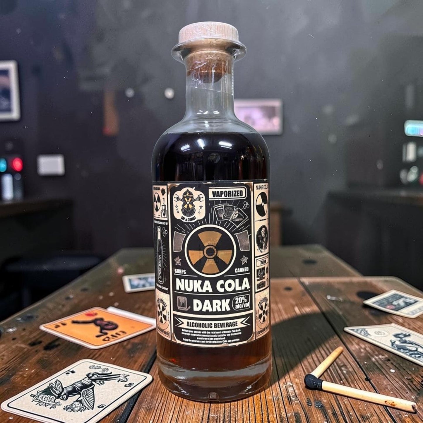 Die Spens Clarens Nuka-Cola Dark alcoholic beverage in a glass bottle with cork, 20% ABV, Fallout themed.