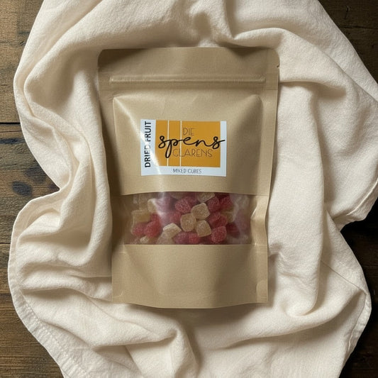Die Spens Clarens mixed fruit cubes in a resealable pouch, featuring red and light yellow chewy pieces.