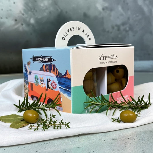 Die Spens Clarens African Oils pitted green olives in bespoke oils, two jars with unique flavour infusions.
