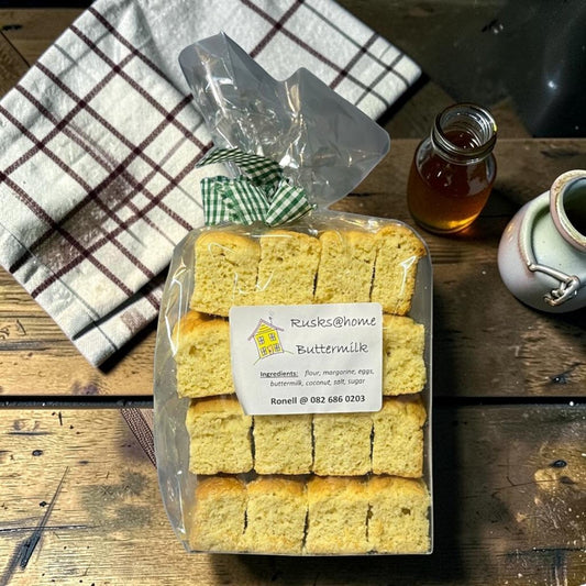 Die Spens Clarens Buttermilk Rusks, golden baked with a satisfying crunch, perfect for dipping in coffee or tea.