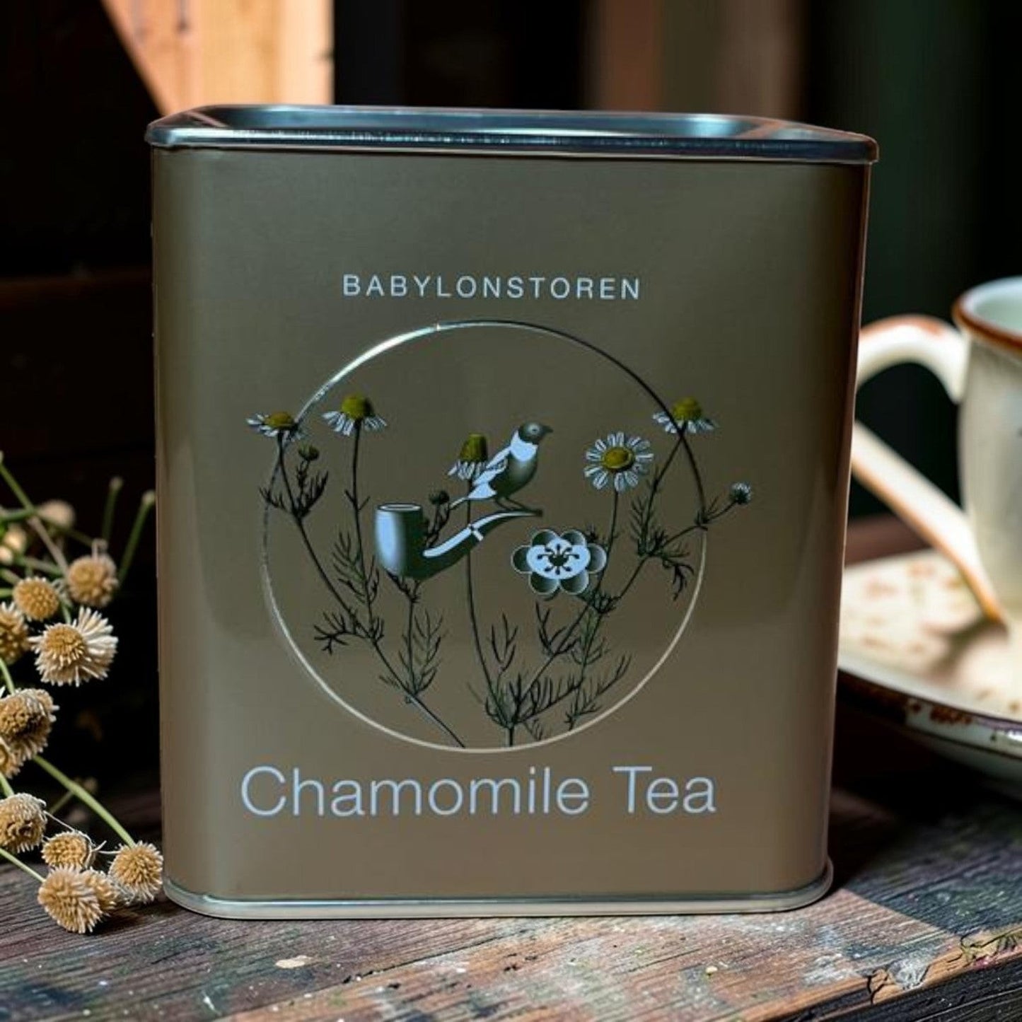 Die Spens Clarens Babylonstoren Chamomile Tea tin with bird and botanical illustration. Gold tin.