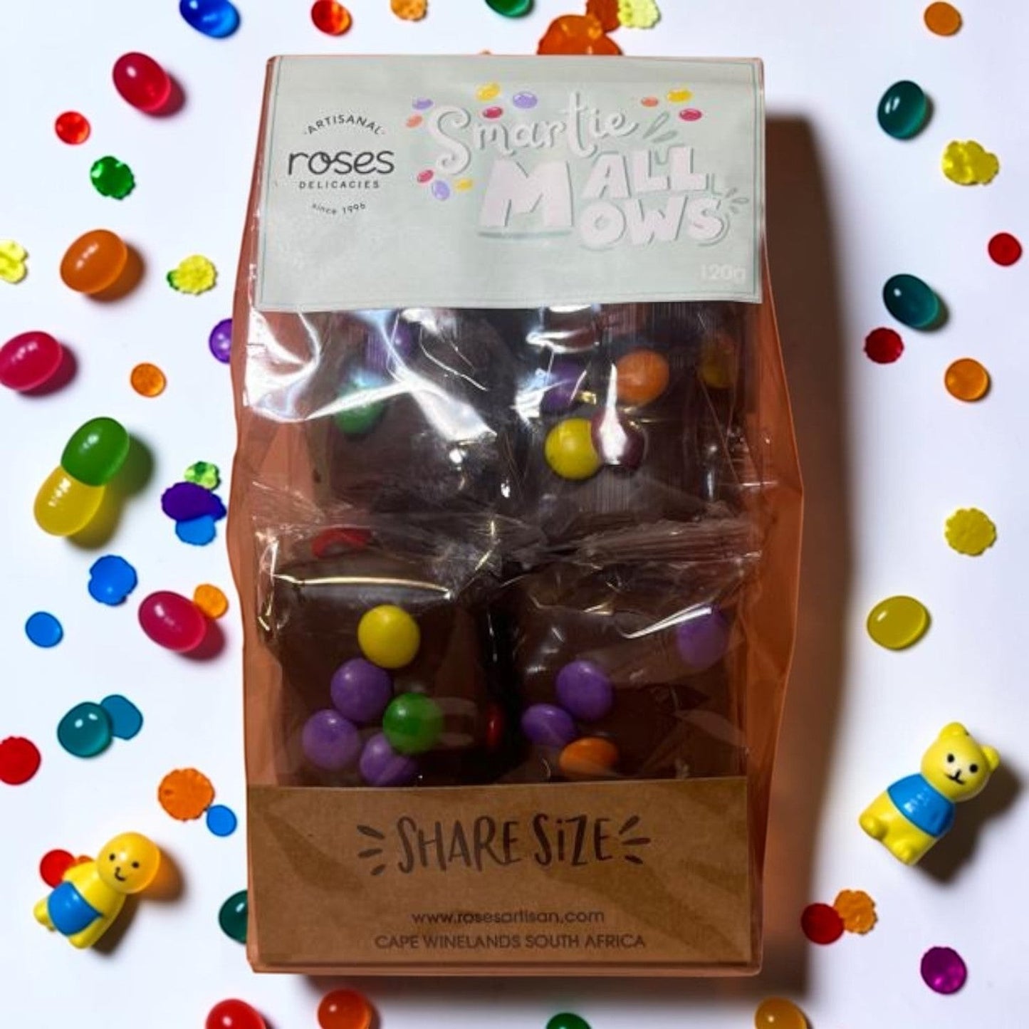 Die Spens Clarens artisanal dark chocolate covered marshmallows topped with colourful Smarties, share size pack.