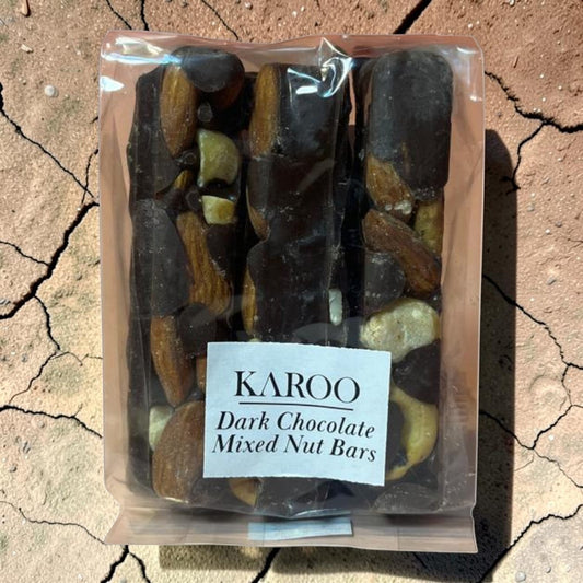 Die Spens Clarens Karoo Dark Chocolate Mixed Nut Bars with whole almonds and other nuts coated in dark chocolate.