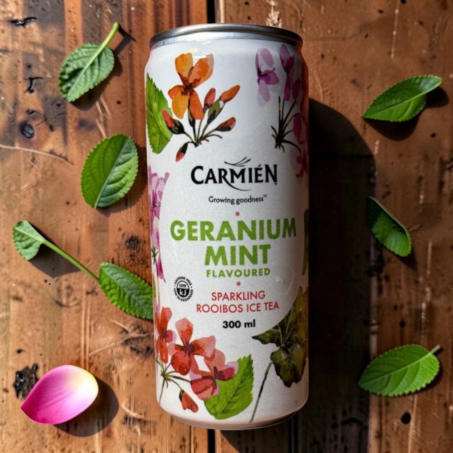 Die Spens Clarens Carmien Geranium Mint Sparkling Rooibos Ice Tea can with floral and mint leaf design.