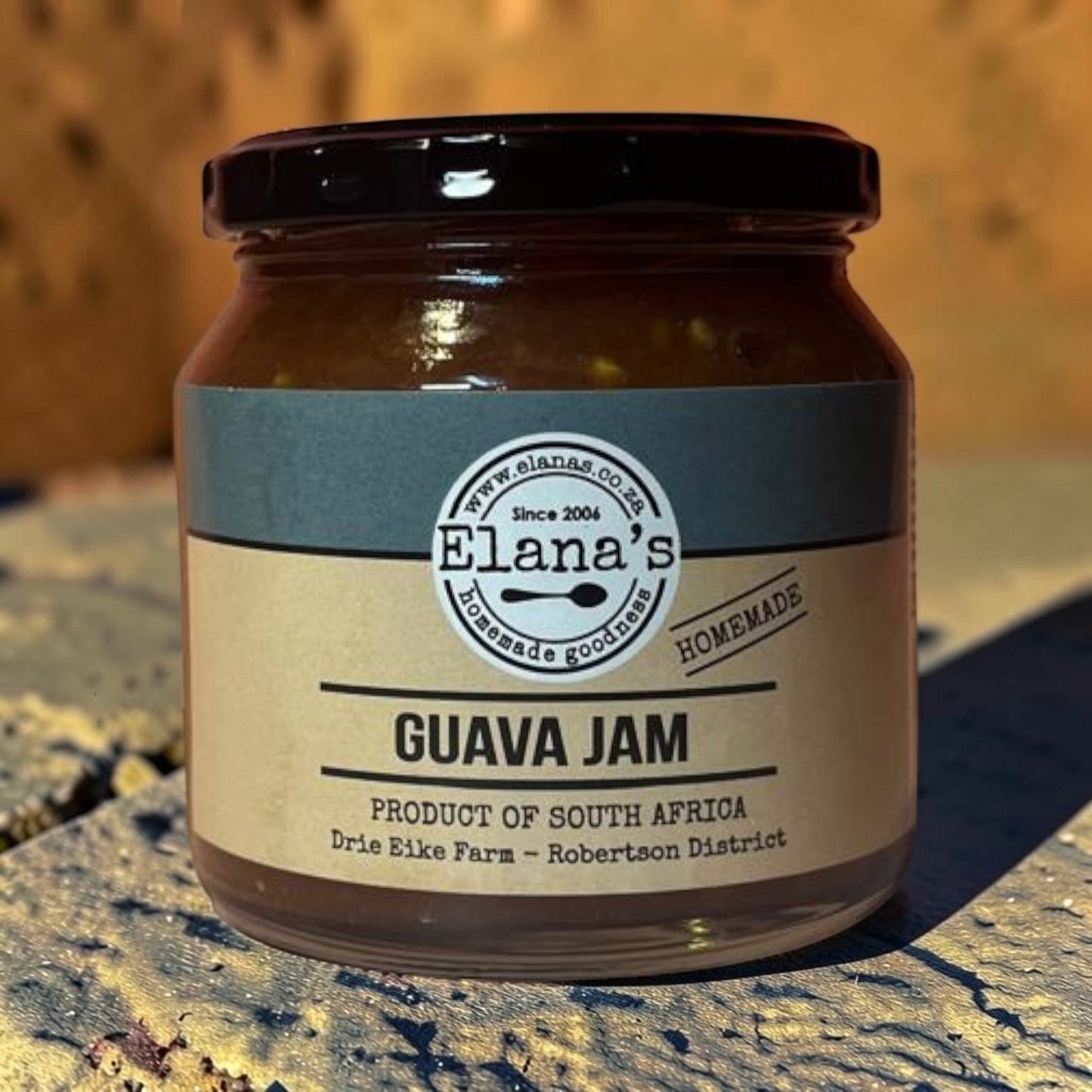 Die Spens Clarens Elana's Guava Jam in a glass jar with a black lid. Homemade goodness from South Africa.