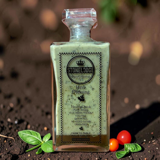 Die Spens Clarens Stonelodge Herb Dressing in a clear glass bottle, plant-based, vegetarian, egg-free, dairy-free, no added sugar, grain-free.
