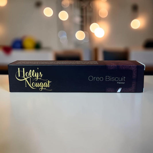 Die Spens Clarens Holly's Nougat Oreo Biscuit flavour box. Dark navy packaging with gold lettering.