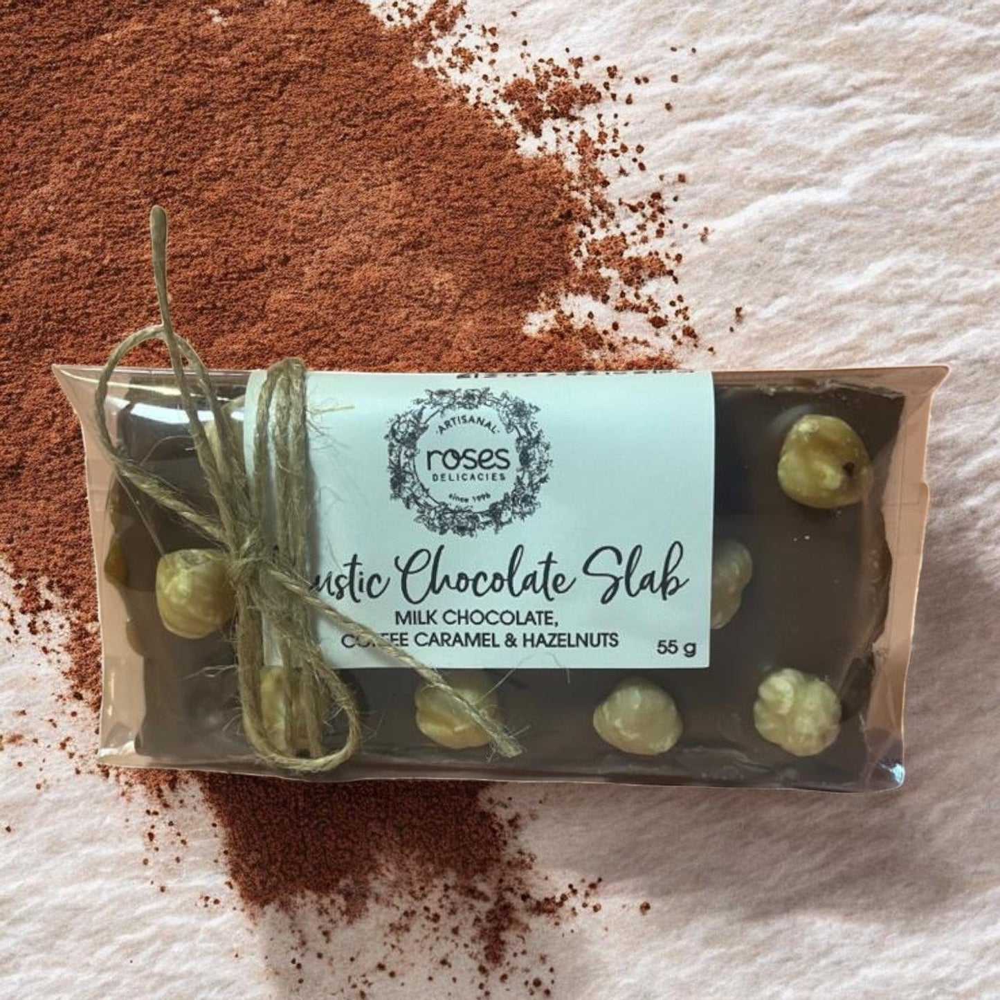 Die Spens Clarens artisanal milk chocolate slab with whole hazelnuts and coffee caramel, 55g.