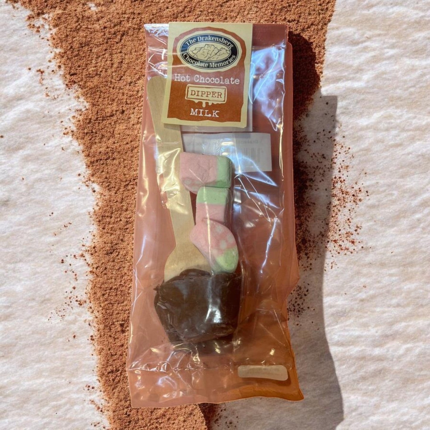 Die Spens Clarens milk chocolate dipper with pastel marshmallows for hot chocolate.