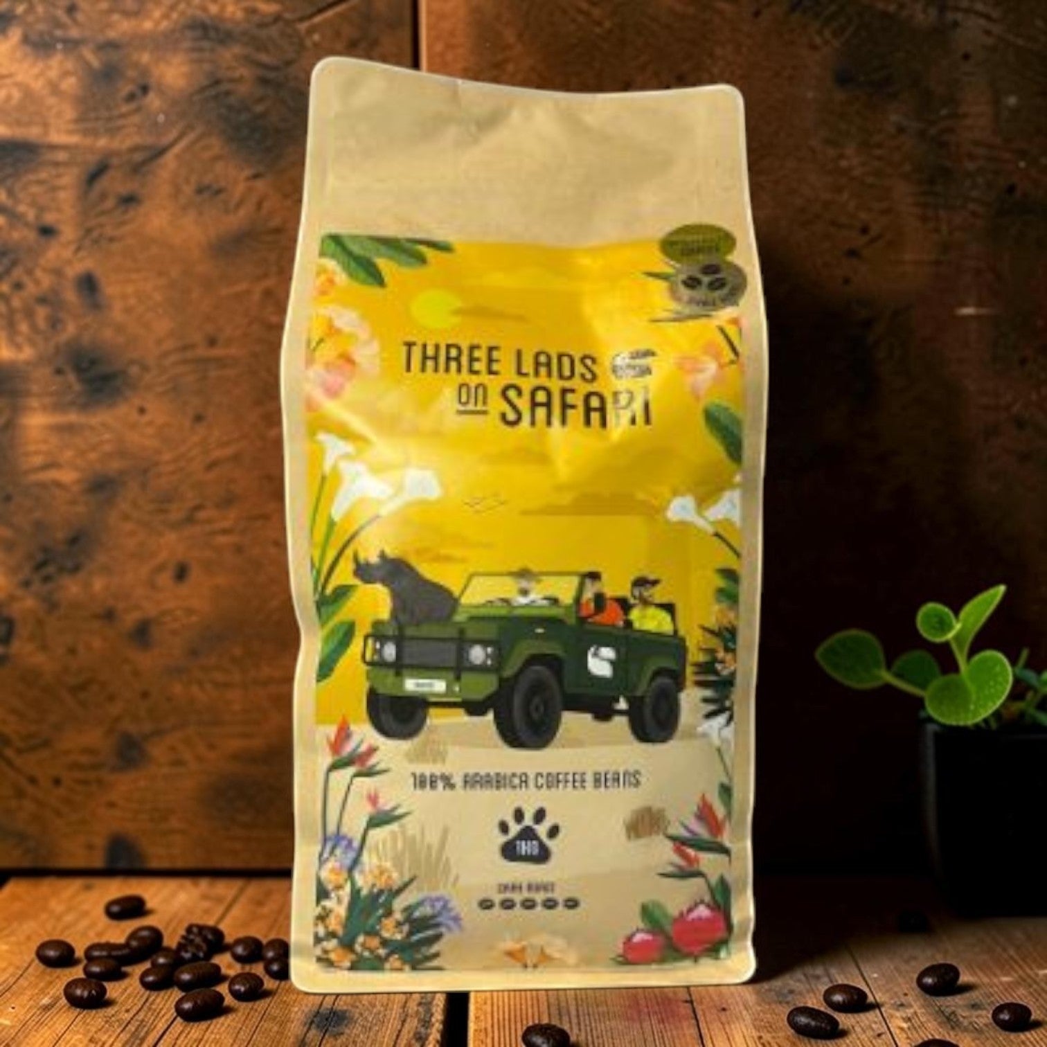 Die Spens Clarens Three Lads on Safari Rhino Beans, 100% Arabica coffee beans in a yellow bag with safari illustration.