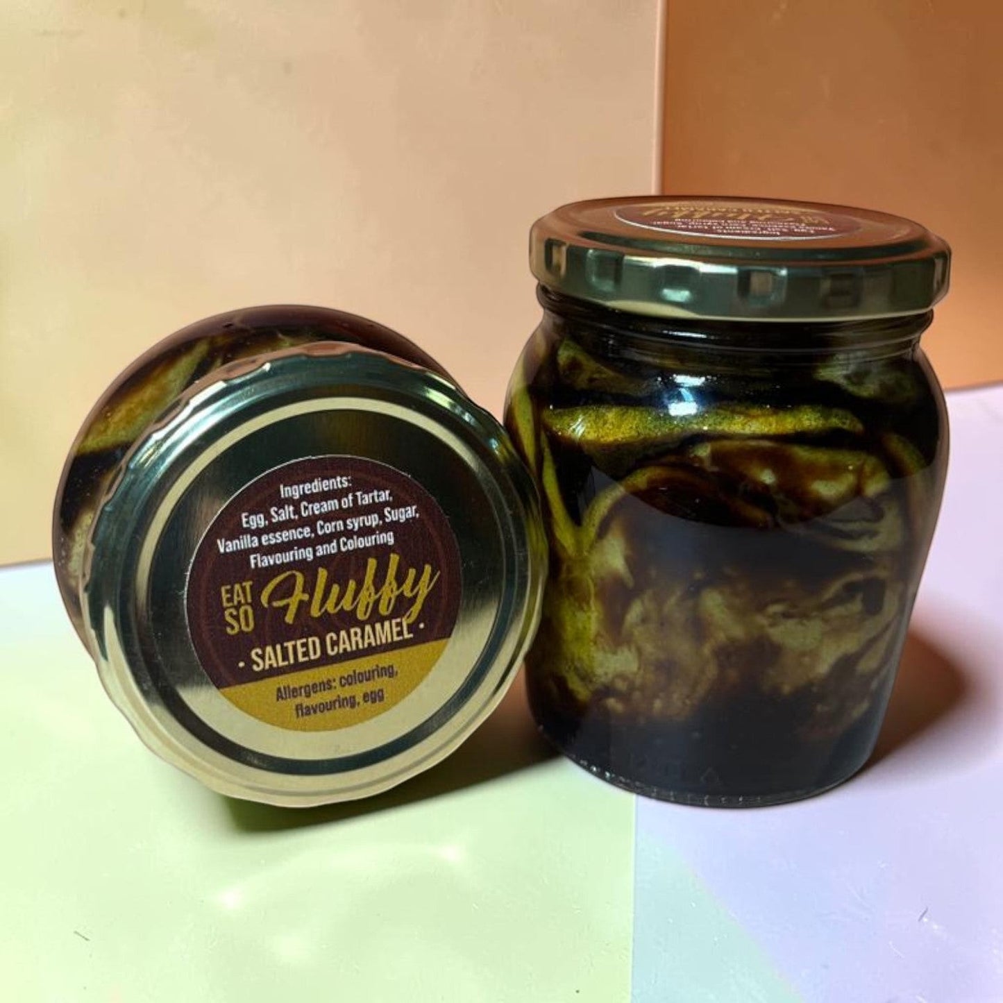 Die Spens Clarens Salted Caramel Fluffy in a glass jar, a swirled caramel confection.