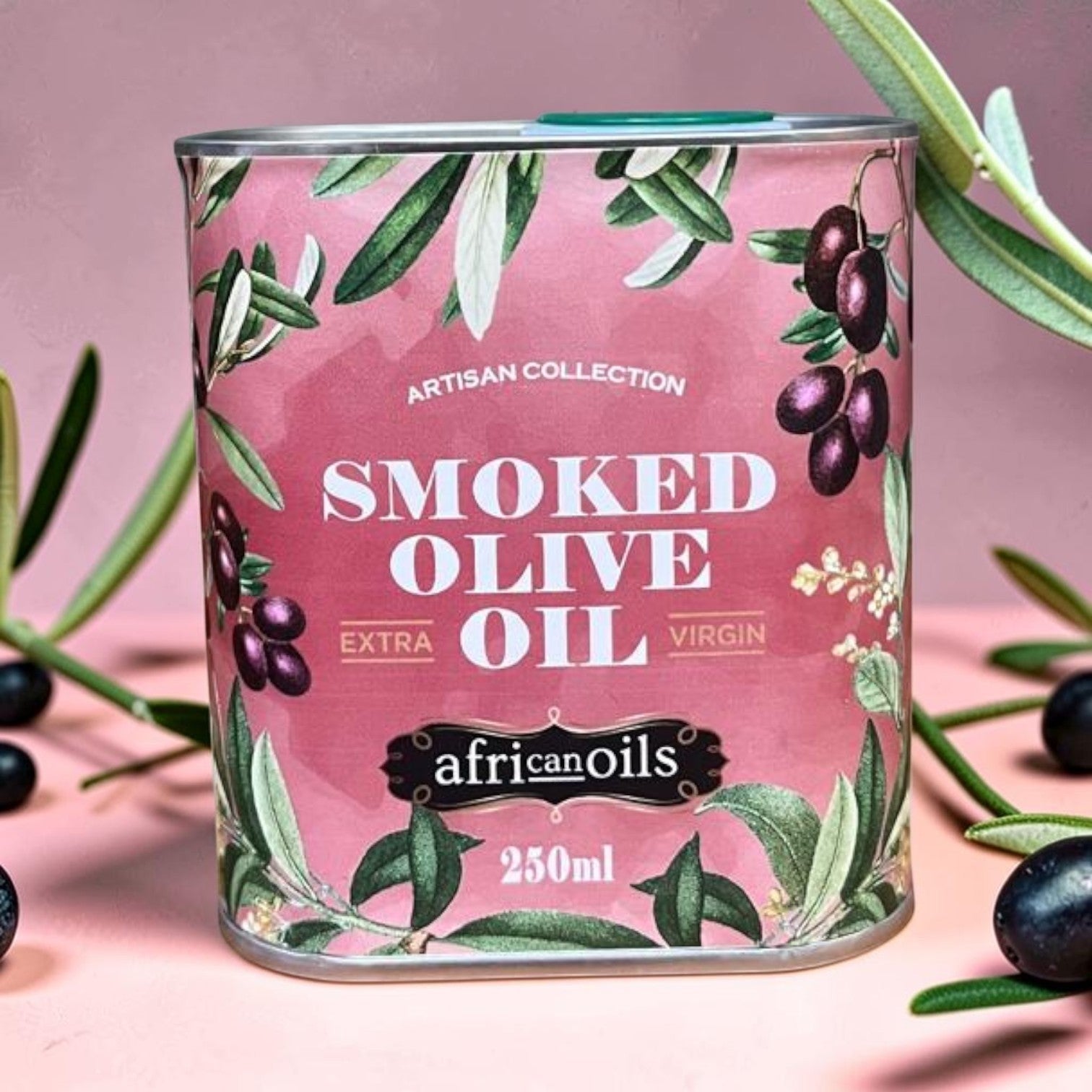 Die Spens Clarens Artisan Collection Smoked Olive Oil, 250ml tin with a pink background and olive branch illustrations.