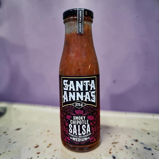 Die Spens Clarens Santa Annas Smoked Chipotle Salsa in a glass bottle, medium heat, Mexican style with South African flair.