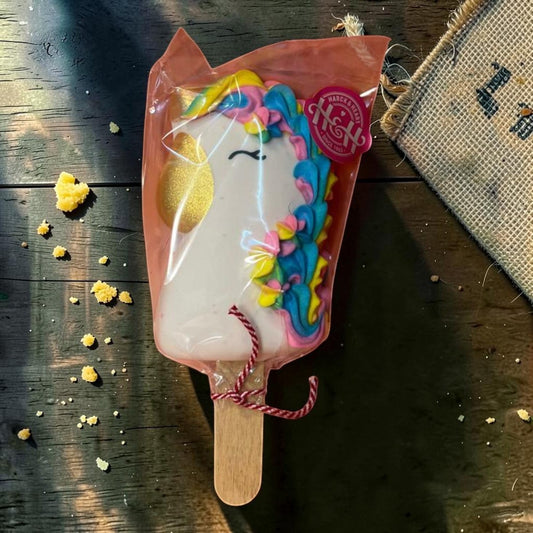 Die Spens Clarens Unicorn Ice Cream Bar with rainbow mane and gold horn.