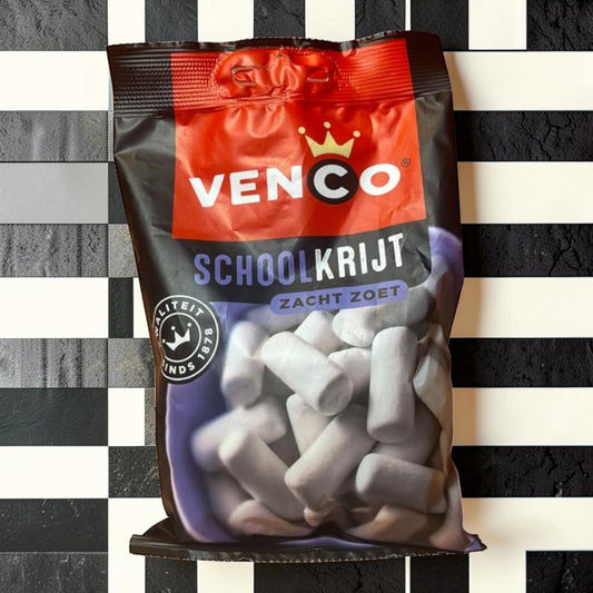 Die Spens Clarens Venco Schoolkrijt Zacht Zoet soft sweet chalk candies in a black bag with red accents.