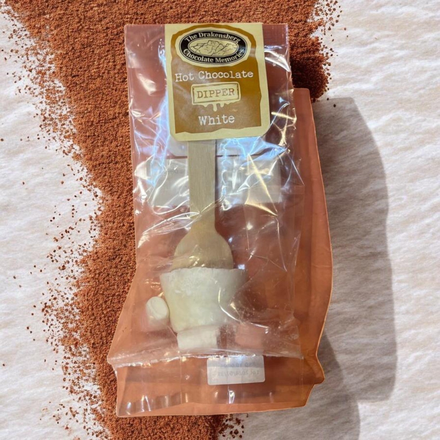 Die Spens Clarens Drakensberg Chocolate Memories white chocolate dipper for hot chocolate, with mini marshmallows.