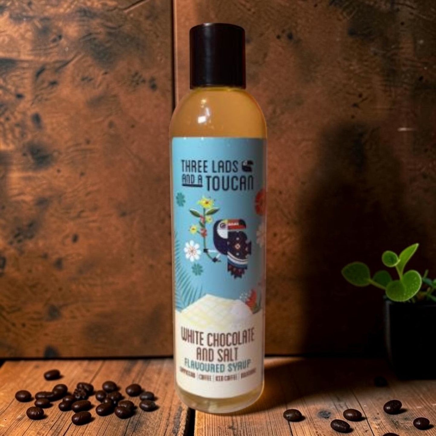Die Spens Clarens Three Lads and a Toucan White Chocolate and Salt Flavoured Syrup bottle with toucan and floral design.