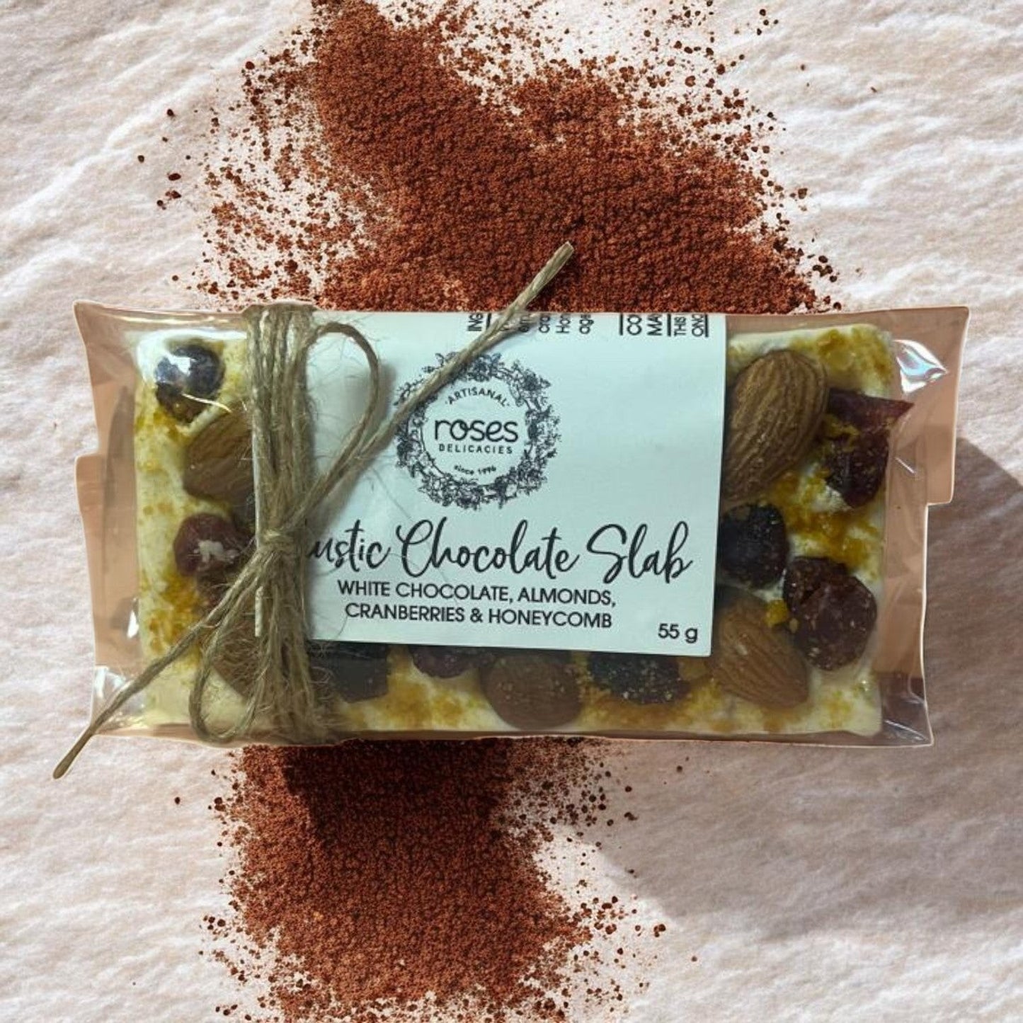 Die Spens Clarens artisanal white chocolate slab with almonds, cranberries, and honeycomb pieces, 55g.