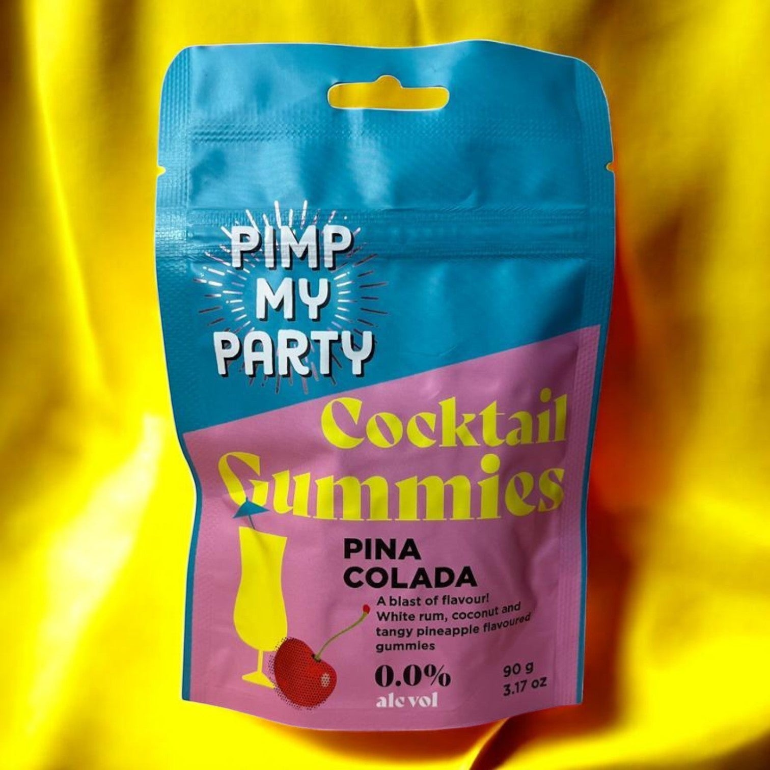 Die Spens Clarens Pimp My Party Pina Colada cocktail gummies bag, featuring a yellow cocktail glass and a red cherry.
