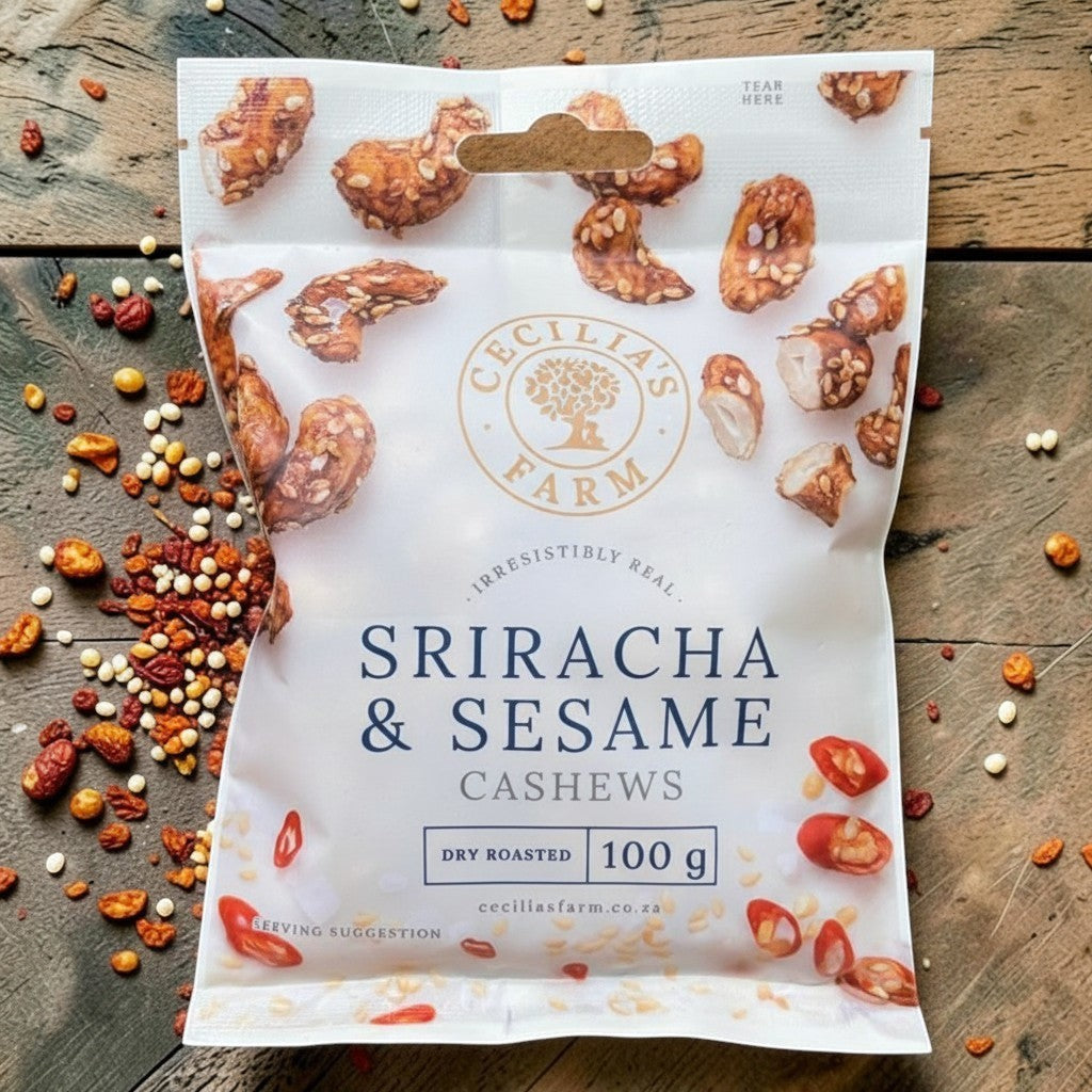 Die Spens Clarens Sriracha & Sesame Cashews, dry roasted with a sweet and spicy glaze and toasted sesame seeds.