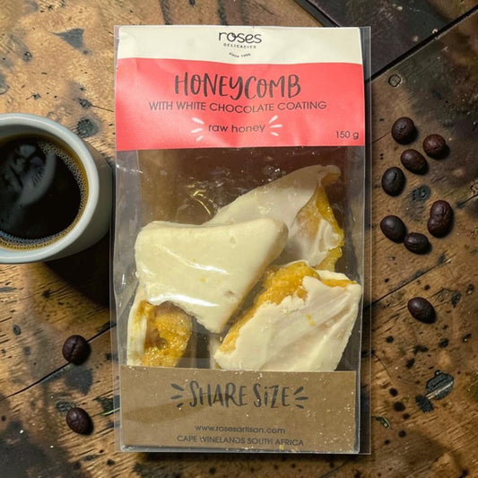 Die Spens Clarens artisanal honeycomb coated in white chocolate, made with raw honey. Share size.